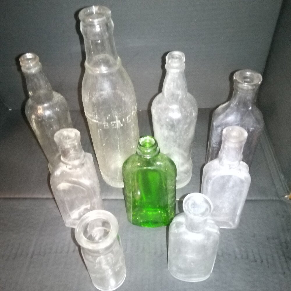 9 Antique EMBOSSED MEDICAL APOTHECARY GLASS BOTTLES